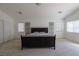 Large main bedroom offering plenty of room, neutral carpet, and natural light at 7325 Perkins Hill St, Las Vegas, NV 89166