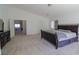 Carpeted main bedroom with ample space, natural light, and a closet at 7325 Perkins Hill St, Las Vegas, NV 89166