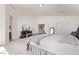 Spacious main bedroom with neutral decor, double doors, and bright natural light at 7325 Perkins Hill St, Las Vegas, NV 89166