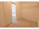 Walk-in closet with neutral carpeting and wire shelving at 7325 Perkins Hill St, Las Vegas, NV 89166