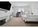 Comfortable main bedroom featuring a dedicated work desk with storage and a cozy bed at 7616 Quail Dust St, North Las Vegas, NV 89084