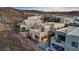 Aerial view of a home with a pool, spa, covered patio, and mountain views at 778 Horizon Canyon Dr, Henderson, NV 89052