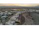 Wide aerial shot capturing community, city skyline, and desert landscape in the distance at 778 Horizon Canyon Dr, Henderson, NV 89052