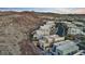 Community aerial view features modern homes, desert landscaping, and winding roads at 778 Horizon Canyon Dr, Henderson, NV 89052