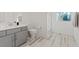 Bright bathroom with modern sink, shower, toilet, and elegant tile flooring at 778 Horizon Canyon Dr, Henderson, NV 89052