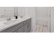 Contemporary bathroom featuring dual sinks, a sleek vanity, and a bathtub at 778 Horizon Canyon Dr, Henderson, NV 89052