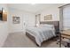Bedroom featuring neutral paint, carpet, desk, and ensuite bathroom at 778 Horizon Canyon Dr, Henderson, NV 89052