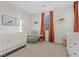 Bright Bedroom features a modern crib, plush chair, and soft decor at 778 Horizon Canyon Dr, Henderson, NV 89052