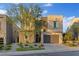 Modern two-story home with a two-car garage and well-maintained landscaping at 778 Horizon Canyon Dr, Henderson, NV 89052