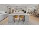 Spacious modern kitchen boasts stainless appliances, gray cabinets, dual islands, and hardwood style flooring at 778 Horizon Canyon Dr, Henderson, NV 89052