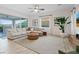 Open living room offers mountain views, a large sectional, and modern décor at 778 Horizon Canyon Dr, Henderson, NV 89052