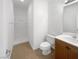 Bright bathroom featuring a shower, toilet, vanity with wood cabinet, and a neutral color palette at 8253 Pearl Oasis Ct, Las Vegas, NV 89139
