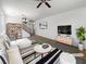 Bright living room with sleek furniture, modern lighting, and stylish decor at 8253 Pearl Oasis Ct, Las Vegas, NV 89139