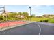 Enjoy outdoor activities on the backyard basketball court, perfect for sports and recreation at 8895 S Tenaya Way, Las Vegas, NV 89113