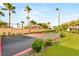 Outdoor basketball court surrounded by mature trees, offering a recreational space for exercise and enjoyment at 8895 S Tenaya Way, Las Vegas, NV 89113