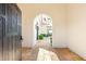 Grand entryway showcasing a view to an outdoor patio, creating an elegant and welcoming ambiance at 8895 S Tenaya Way, Las Vegas, NV 89113