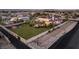 Expansive home on a sprawling lot with a basketball court and pristine landscaping at 8895 S Tenaya Way, Las Vegas, NV 89113