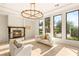Bright living room featuring a fireplace with lots of natural light at 8895 S Tenaya Way, Las Vegas, NV 89113