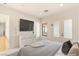 Bright and spacious main bedroom with modern furnishings and outdoor access at 8895 S Tenaya Way, Las Vegas, NV 89113