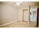 Neutral bedroom featuring carpeted floor, a ceiling fan and closet with double doors at 9144 Clear Sky Ave, Las Vegas, NV 89178