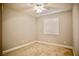 Bedroom featuring tan carpet, neutral paint, and window with white shutters at 9144 Clear Sky Ave, Las Vegas, NV 89178