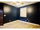 Bedroom with dark blue walls, ceiling fan, and shuttered window at 9144 Clear Sky Ave, Las Vegas, NV 89178