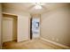 Bedroom with carpet, closet, and neutral walls in neutral modern home at 9144 Clear Sky Ave, Las Vegas, NV 89178