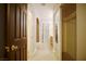 Hallway features walk-in closet and doorway to bathroom with tub shower at 9144 Clear Sky Ave, Las Vegas, NV 89178