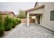 View of the brick paver patio featuring an outdoor covered area perfect for entertaining at 9144 Clear Sky Ave, Las Vegas, NV 89178