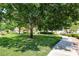 Well-maintained green space with mature trees, providing a peaceful and shaded environment for residents at 928 Shades End Ave, North Las Vegas, NV 89081