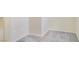 Room boasts neutral walls and gray carpet, illuminated by natural light at 928 Shades End Ave, North Las Vegas, NV 89081