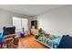 Bedroom with hardwood floor, a window and toys at 931 Highland Trails Ave, Henderson, NV 89015
