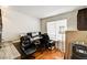 Home office/bedroom with wood floors, a large window, and ample space at 931 Highland Trails Ave, Henderson, NV 89015
