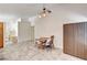 Spacious dining area boasts tile floors and ample natural light, perfect for Gathering meals at 931 Highland Trails Ave, Henderson, NV 89015
