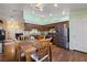 Well-equipped kitchen with wooden cabinets, granite countertops, and stainless steel appliances at 9329 Mountain Cliffs Ave, Las Vegas, NV 89129