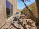 Small backyard with stone landscaping at 9384 Hosner St, Las Vegas, NV 89178