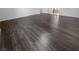 Bedroom with a hardwood floor and a view to a bathroom at 9384 Hosner St, Las Vegas, NV 89178