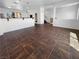 Open-concept living space featuring tile floors and recessed lighting at 9384 Hosner St, Las Vegas, NV 89178