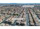 Aerial view of a residential area with uniform homes, highlighting proximity to Durango Casino/Resort in the background at 9713 Kampsville Ave, Las Vegas, NV 89148
