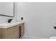 Modern bathroom features a sleek vanity, contemporary fixtures, and a minimalist design at 9713 Kampsville Ave, Las Vegas, NV 89148