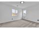 Bright and airy bedroom with large windows, providing natural light and neighborhood views at 9713 Kampsville Ave, Las Vegas, NV 89148