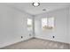Sun-filled bedroom featuring a dual window view, adding brightness and charm to the interior at 9713 Kampsville Ave, Las Vegas, NV 89148