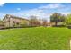 Green community park with wooden pergola and benches, offering a shared outdoor space for residents to enjoy nature and recreation at 9713 Kampsville Ave, Las Vegas, NV 89148
