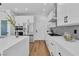Sleek, modern kitchen featuring stainless steel appliances and light wood floors at 9713 Kampsville Ave, Las Vegas, NV 89148