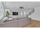 Bright and airy living room with hardwood floors, large windows, and comfortable seating at 9713 Kampsville Ave, Las Vegas, NV 89148