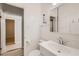 Clean bathroom featuring a classic white vanity, toilet, and minimalist design at 103 W Victory Rd, Henderson, NV 89015