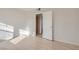 Bright bedroom featuring hard surface floors and a neutral color scheme at 103 W Victory Rd, Henderson, NV 89015
