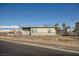 Inviting single-story home boasting a fenced yard and proximity to neighborhood amenities at 103 W Victory Rd, Henderson, NV 89015