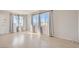 Spacious living room with hardwood floors, ample natural light, and neutral color palette at 103 W Victory Rd, Henderson, NV 89015