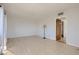 Open living room with hardwood floors, neutral walls, and natural light, creating a bright and airy space at 103 W Victory Rd, Henderson, NV 89015